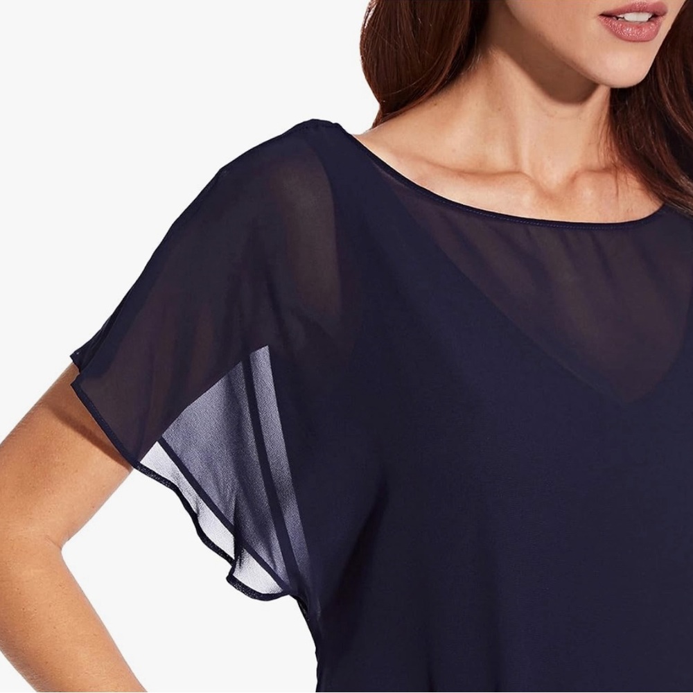 Delicate sheer blue blouse